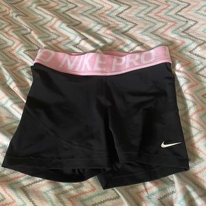 woman’s small nike pros light pink waistband